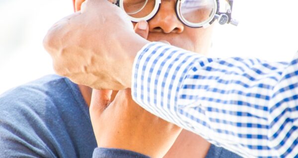 person wearing loupe glasses