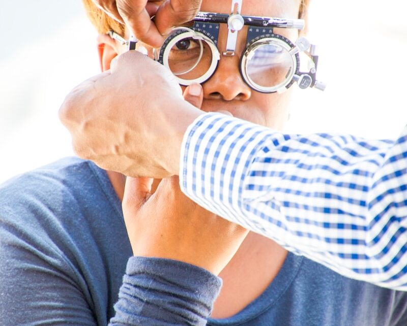 person wearing loupe glasses